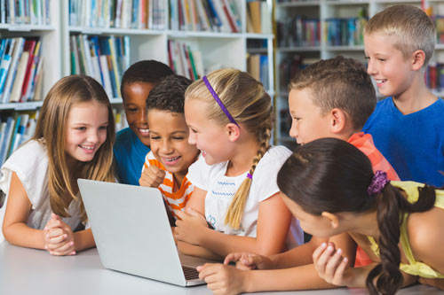 Kids on Laptop in Library